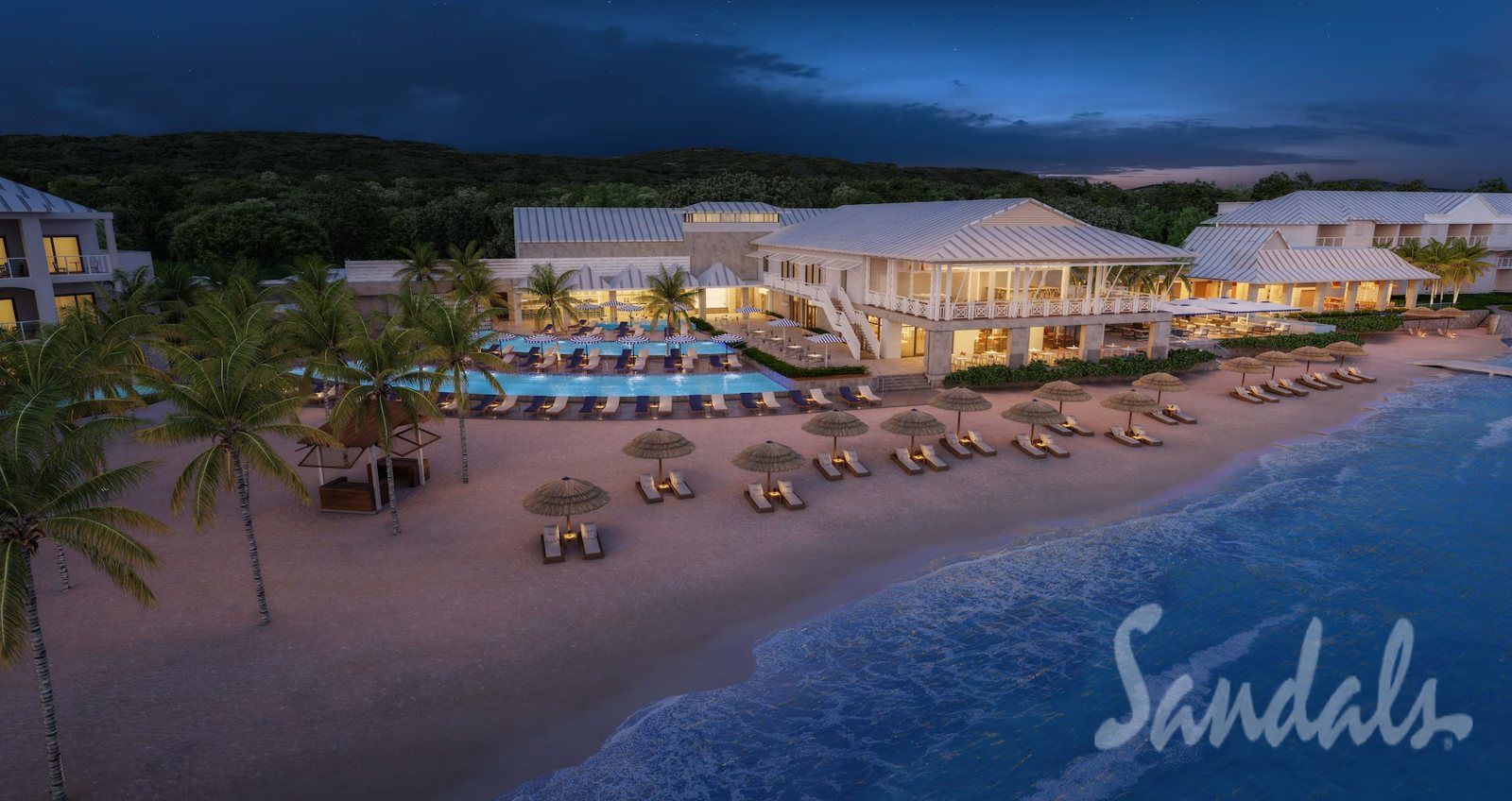 A Sandals beachfront resort on Jamaica's coast at dusk. Photo: Sandals Resorts